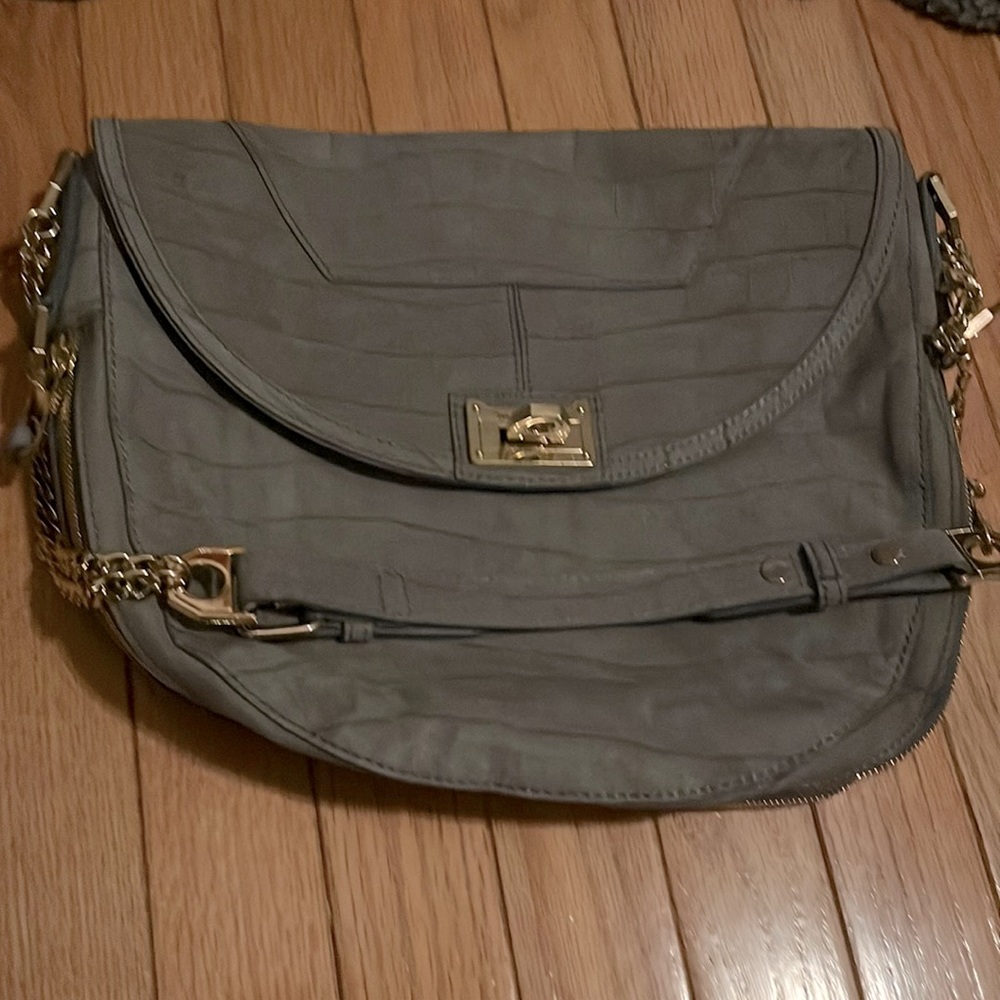 Rebecca Minkoff gray bag with gold hardwear. Never used.